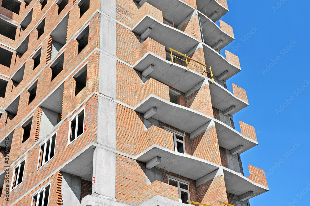 Building construction site work against blue sky Building construction site work against blue sky