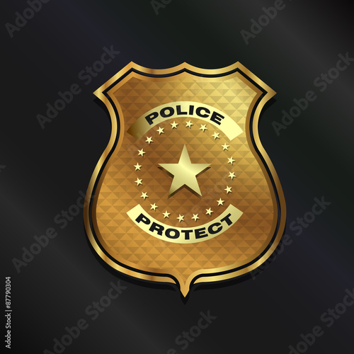 Gold Police Badge isolated on black background