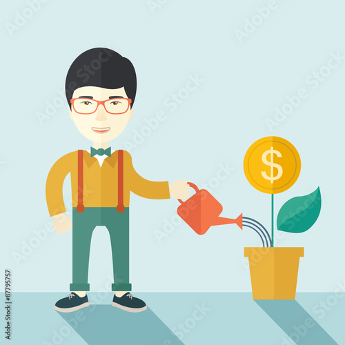 Chines Business person watering a growing plant.