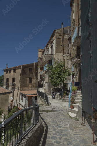 Pisciotta  Cilento  Italy. Small medieval village. Small squares  streets  stairways  Mediterranean colors  stone  bricks  doors and portals. Sky  sun and sea.