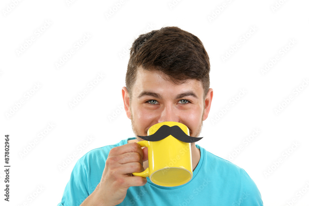 Portrait of man drinking from cup with cutout mustache, isolated on white Portrait of man drinking from cup with cutout mustache, isolated on white