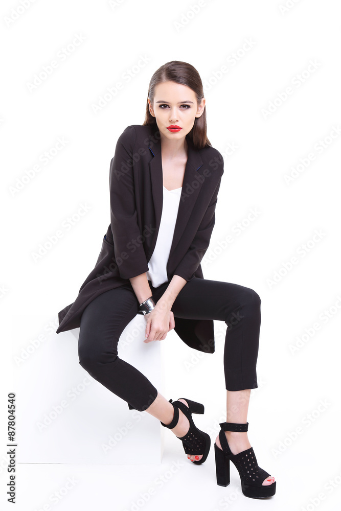 high fashion portrait of young elegant woman. Studio shot high fashion portrait of young elegant woman. Studio shot