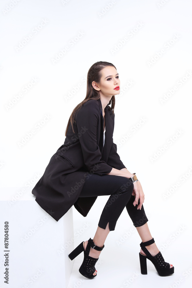 high fashion portrait of young elegant woman. Studio shot high fashion portrait of young elegant woman. Studio shot