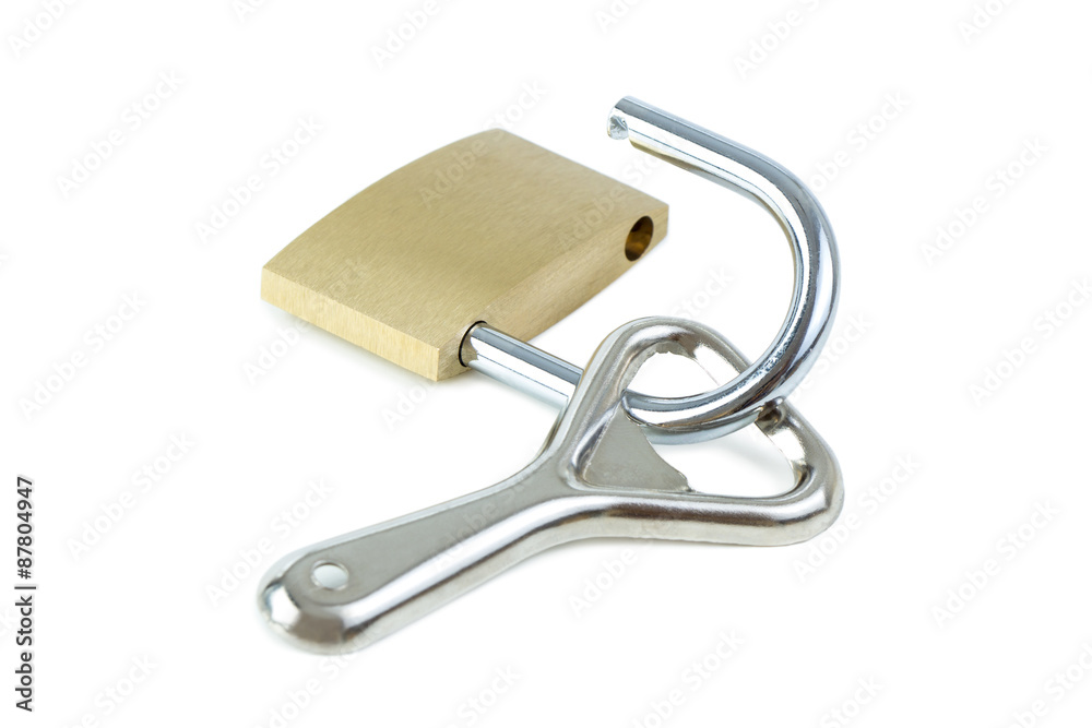 Bottle opener and an unlocked padlock. Concept photo of drinking problem and alcoholism.