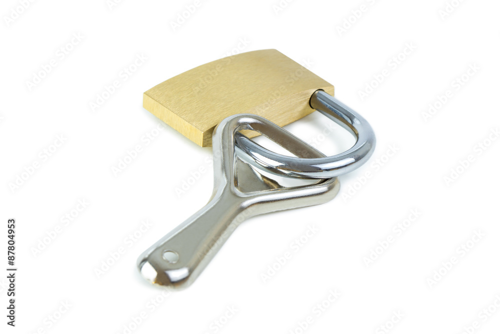 Bottle opener locked to a padlock. Concept photo of drinking problem and alcoholism. Bottle opener locked to a padlock. Concept photo of drinking problem and alcoholism.