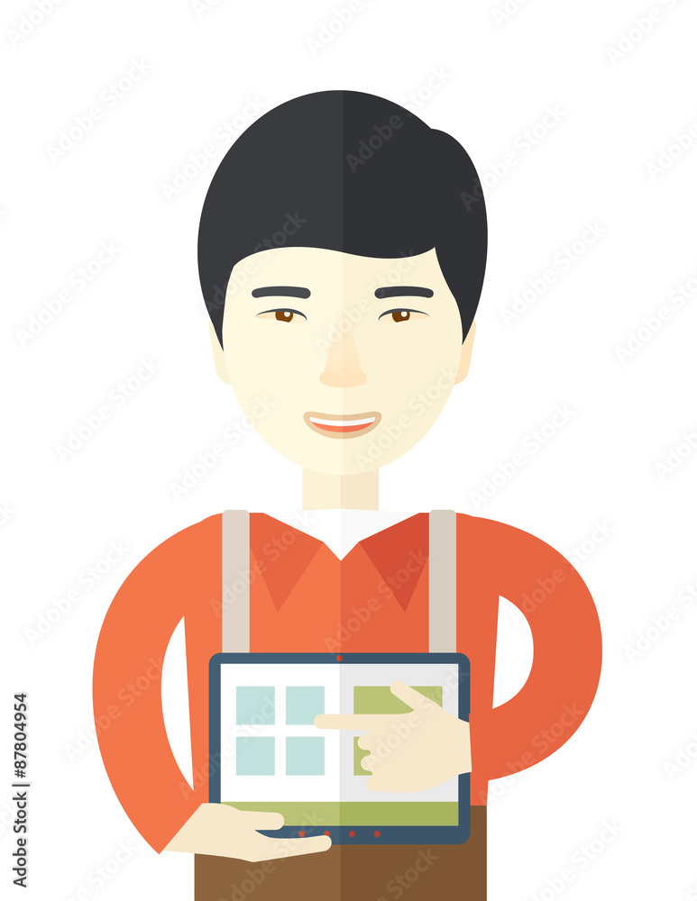 Chinese man standing with his tablet. Chinese man standing with his tablet.