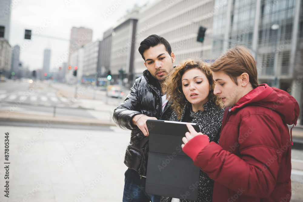 Multiracial business people working outdoor in town Multiracial business people working outdoor in town