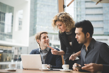 Multiracial business people working outdoor in town