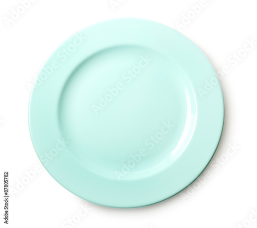 Empty colorful plate isolated on white © Africa Studio