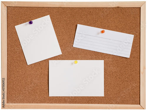 Blank paper pin up on cork board isolated on white background