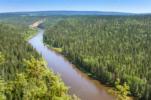 Panorama bend of the river among the green forest aerial photo