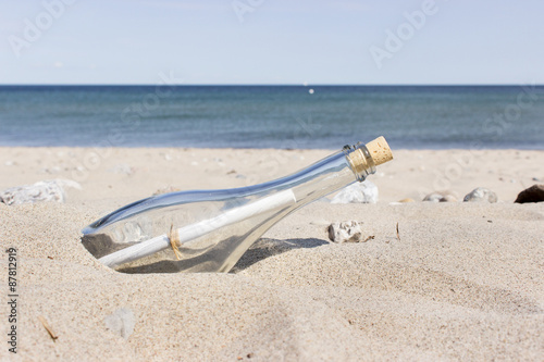Message in a Bottle on the sandy beach
