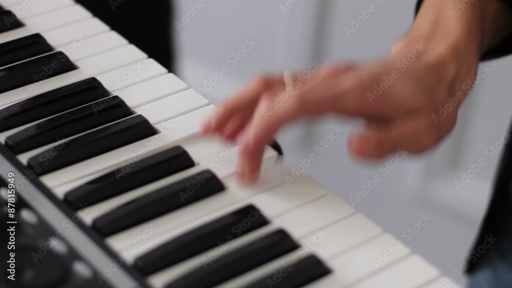 young skilled man plays piano young skilled man plays piano