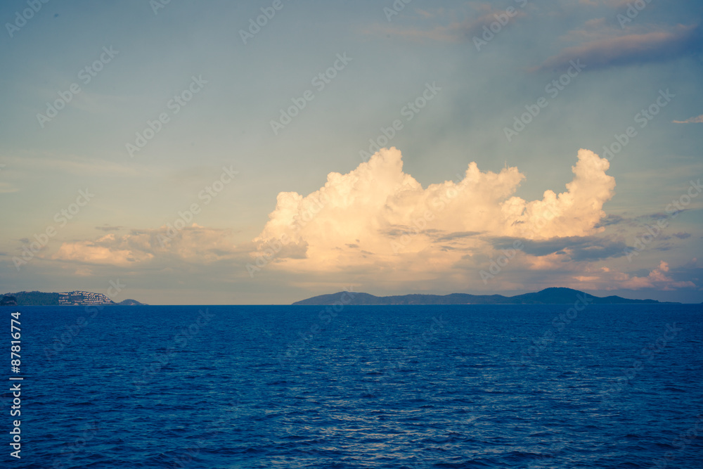 Retro sky with clouds over sea. Nature composition.