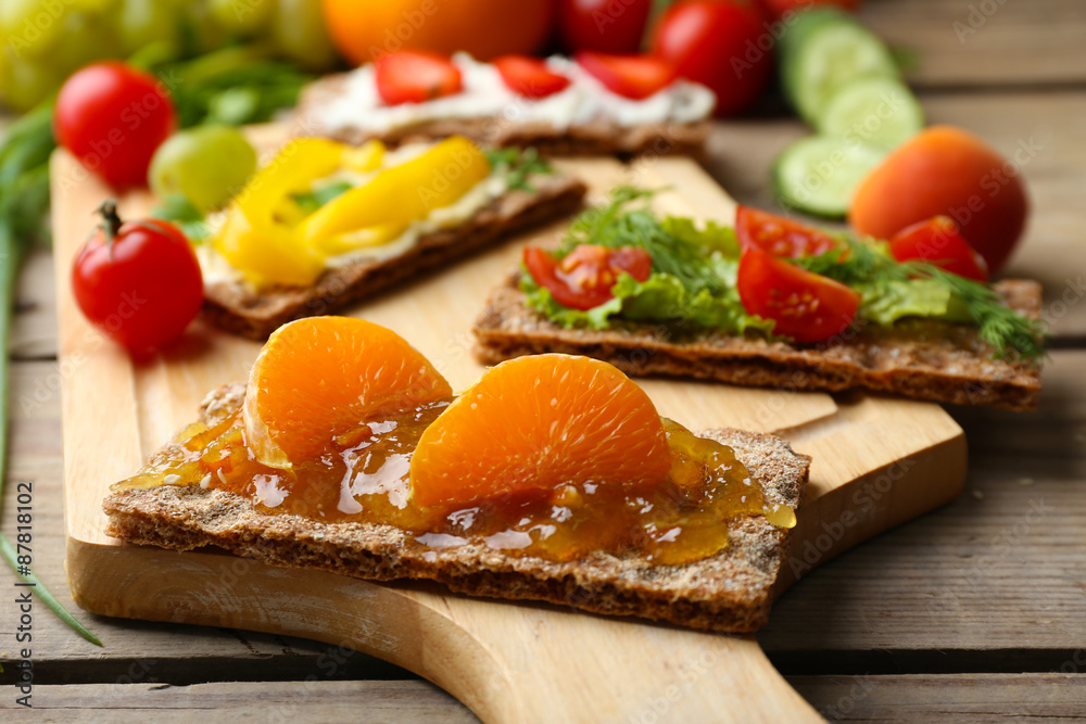 Still life with vegetarian sandwiches on wooden table Still life with vegetarian sandwiches on wooden table