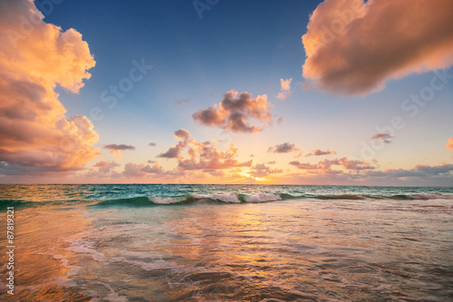 Sunrise on the beach of Caribbean sea