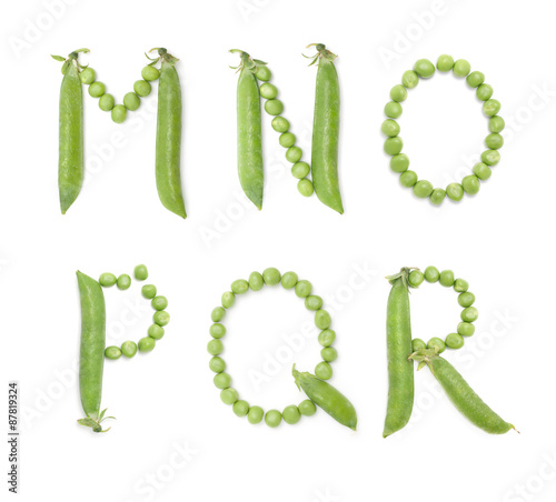 Letters of english alphabet with green peas, abc photo