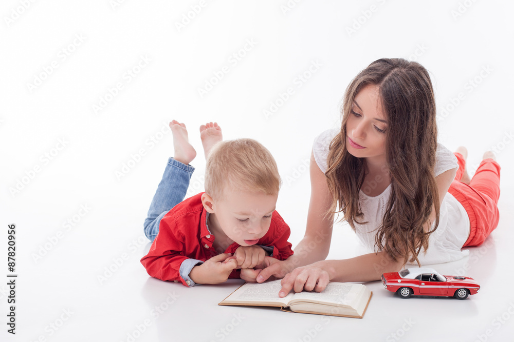 Beautiful young woman is spending time with her kid Beautiful young woman is spending time with her kid