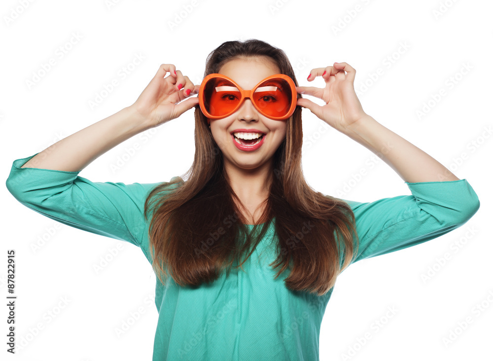 Playful young woman with party glasses. Ready for good time. Playful young woman with party glasses. Ready for good time.