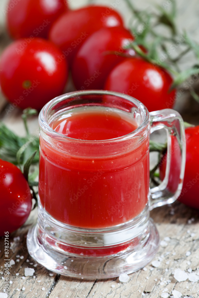 Tomato juice in old-fashioned mug, selective focus Tomato juice in old-fashioned mug, selective focus