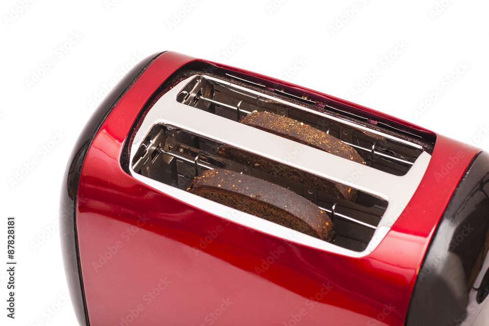 Red toaster and two slices of bread isolated on white Red toaster and two slices of bread isolated on white