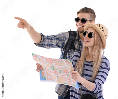 Pair of travelers with map ...