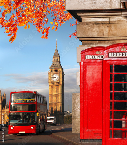 Big Ben with bus and red phone boxes in London, England #87830128