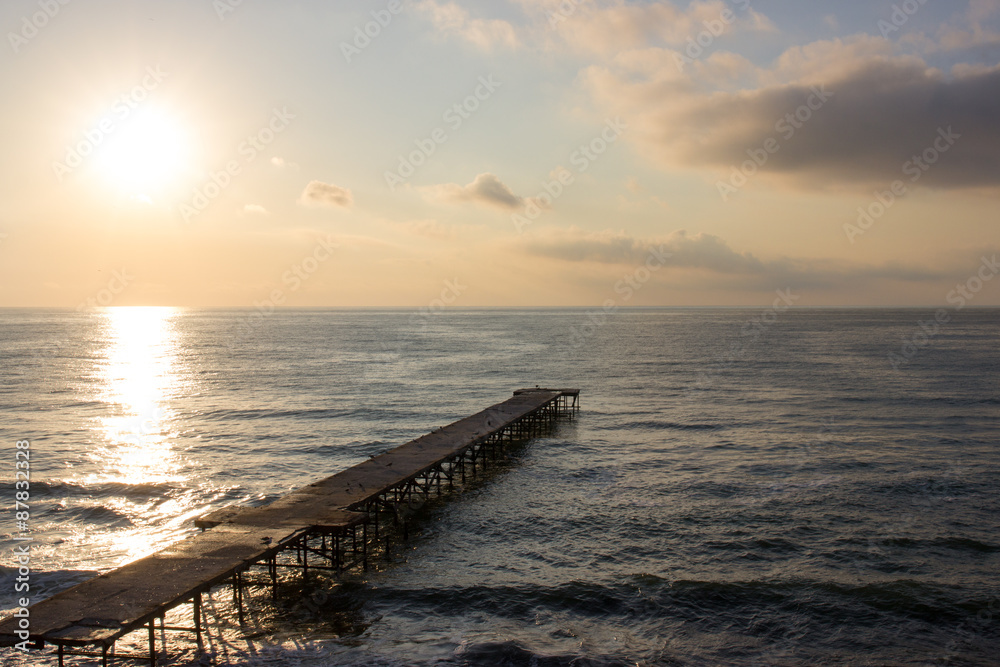 Sunrise over sea pier Sunrise over sea pier