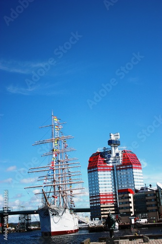 Gothenburg waterfront and Lilla Bommen (House) under blue sky photo