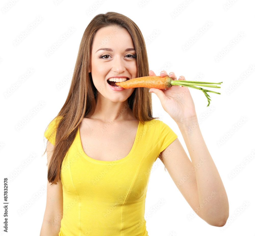 Healthy young woman eating carrot isolated on white Healthy young woman eating carrot isolated on white