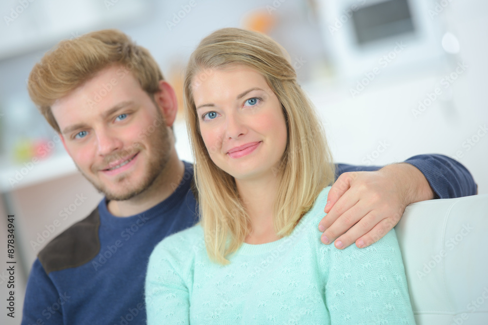 Happy couple relaxing at home Happy couple relaxing at home
