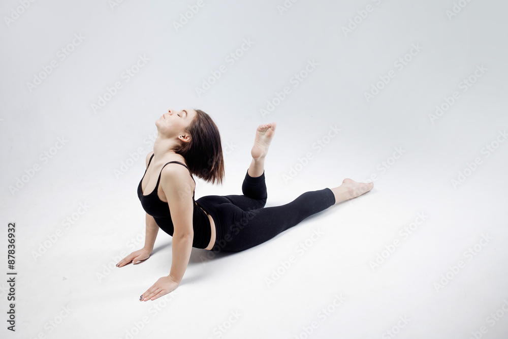 athletic girl posing in Studio, place for your text on the right athletic girl posing in Studio, place for your text on the right