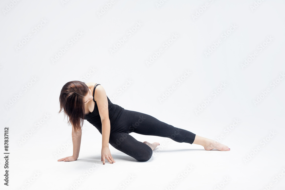 athletic girl posing in Studio, place for your text on the right athletic girl posing in Studio, place for your text on the right