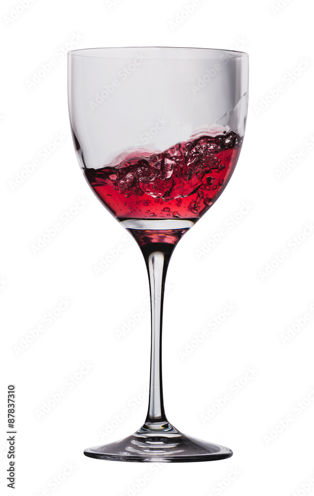 wine is poured into a glass on a white background wine is poured into a glass on a white background