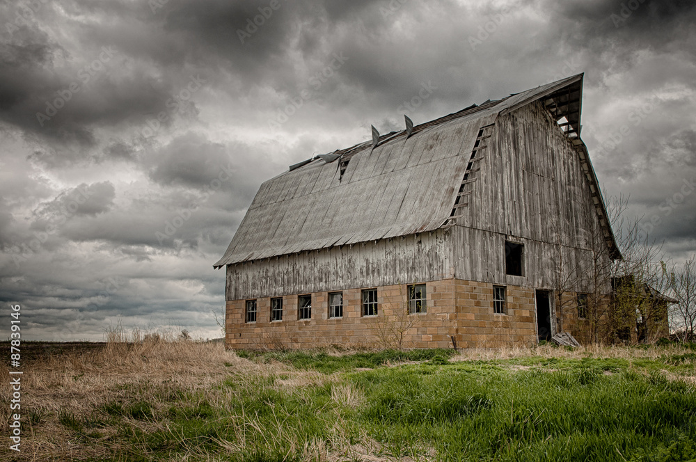 Stormy barn. Old barn on prairie with stormy sky, USA Stormy barn. Old barn on prairie with stormy sky, USA