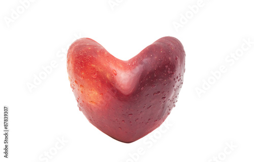 Red apple in heart shape Isolated on white background © yurchello108