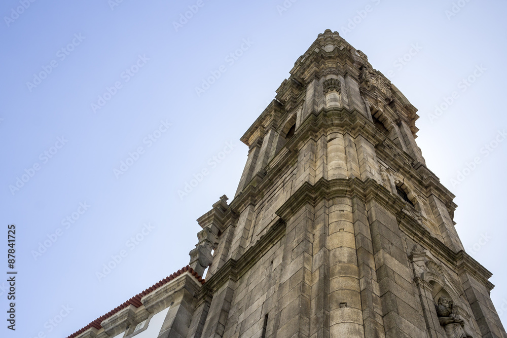 Bell tower of the Clerigos Church in blue sky background,
