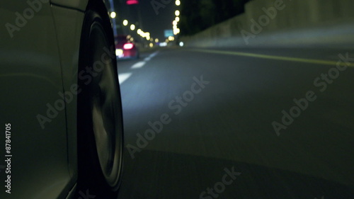 Sports car highway wheel at night photo