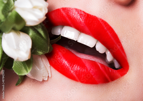 beautiful sexy lips saturated color with a bouquet of flowers