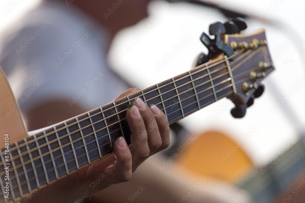 Obraz premium playing guitar on stage