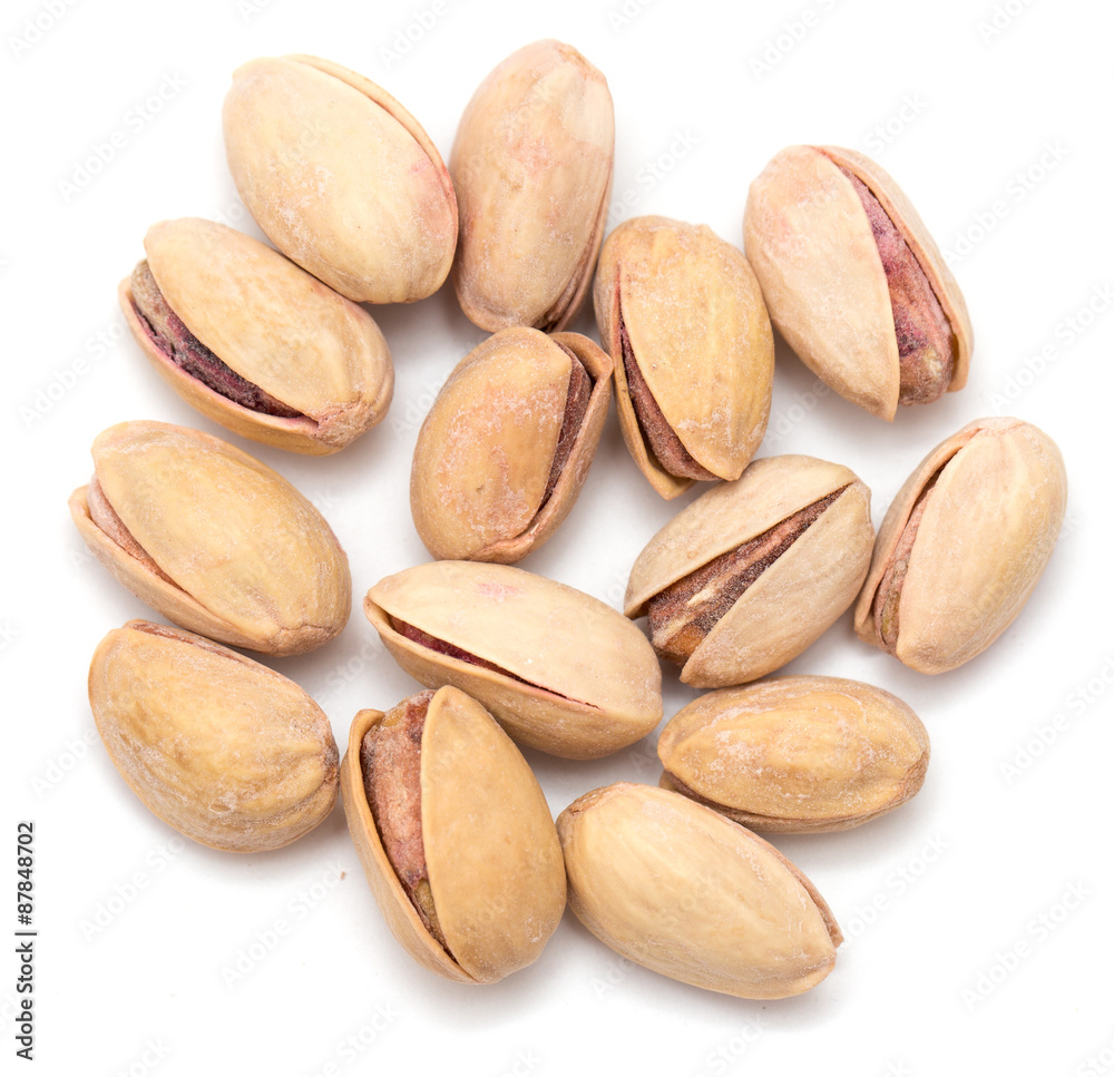 pistachios on a white background. close pistachios on a white background. close