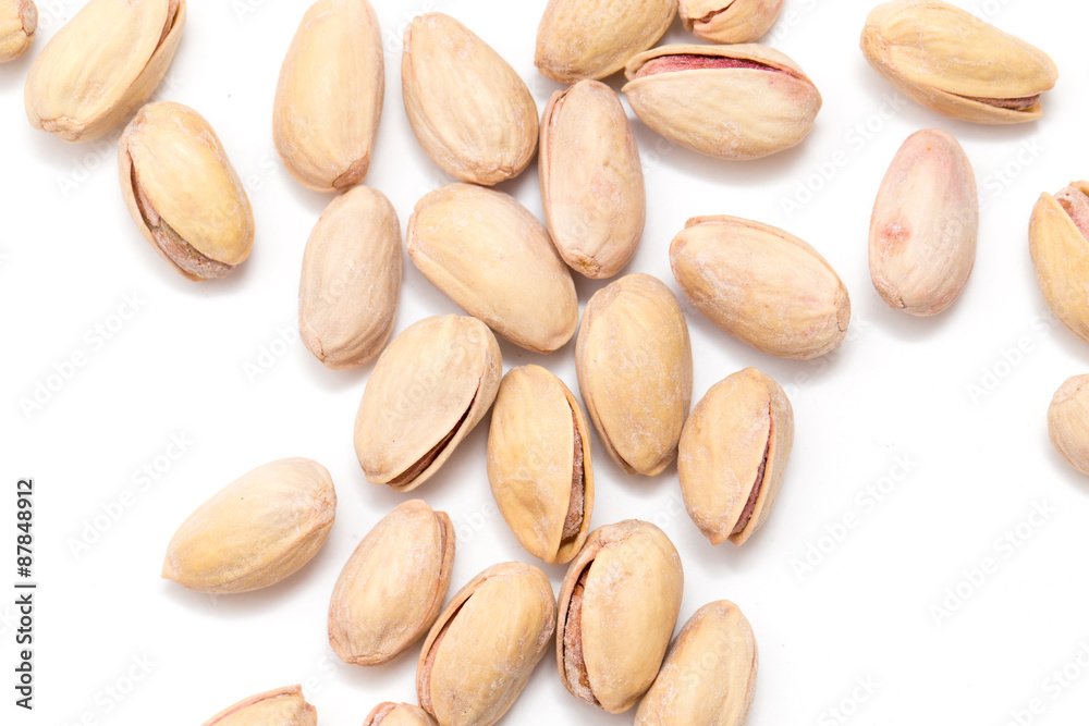 pistachios on a white background. close pistachios on a white background. close