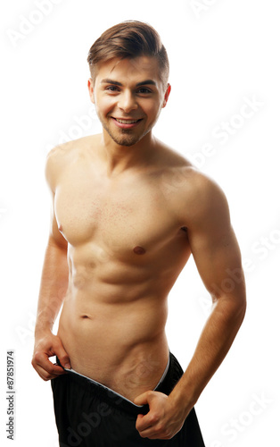 Muscle young man isolated o...