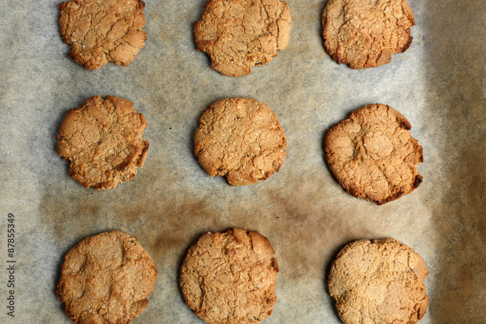 Homemade cookies on baking sheet close up