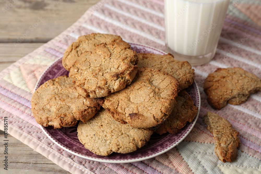 Homemade cookies and glass of milk on table close up Homemade cookies and glass of milk on table close up
