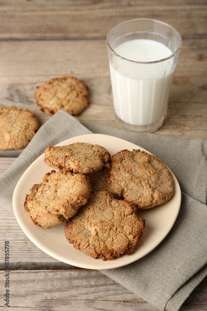 Homemade cookies and glass of milk on table close up Homemade cookies and glass of milk on table close up