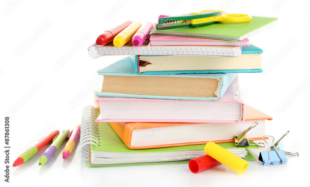 Stack of books and stationery isolated on white Stack of books and stationery isolated on white