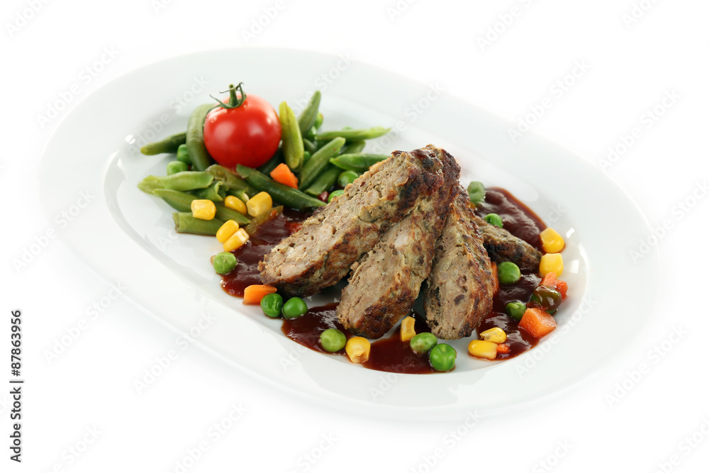 Tasty slices of meat with vegetables on plate isolated on white