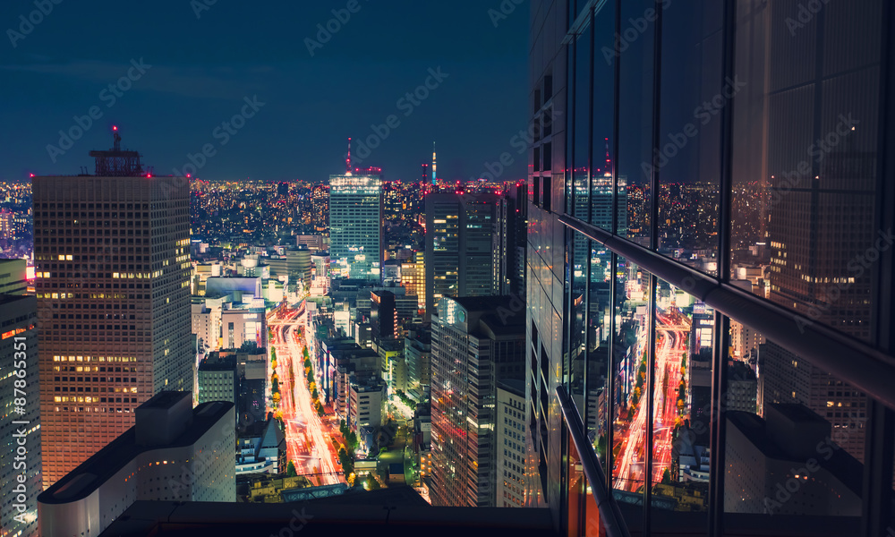 Aerial view cityscape at night in Tokyo, Japan from a skyscraper