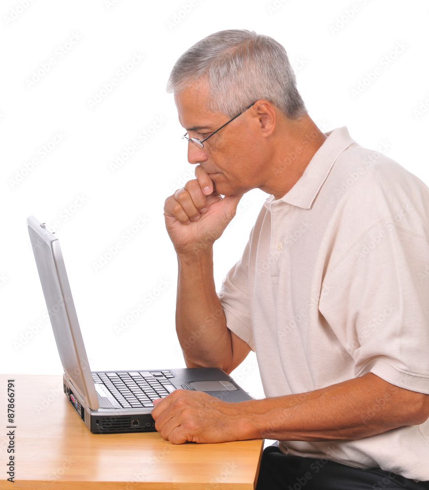 Businessman Seated at Computer Businessman Seated at Computer